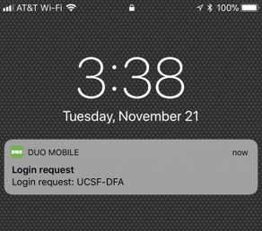 screen capture of iPhone home screen with Duo "Login request" notification alert