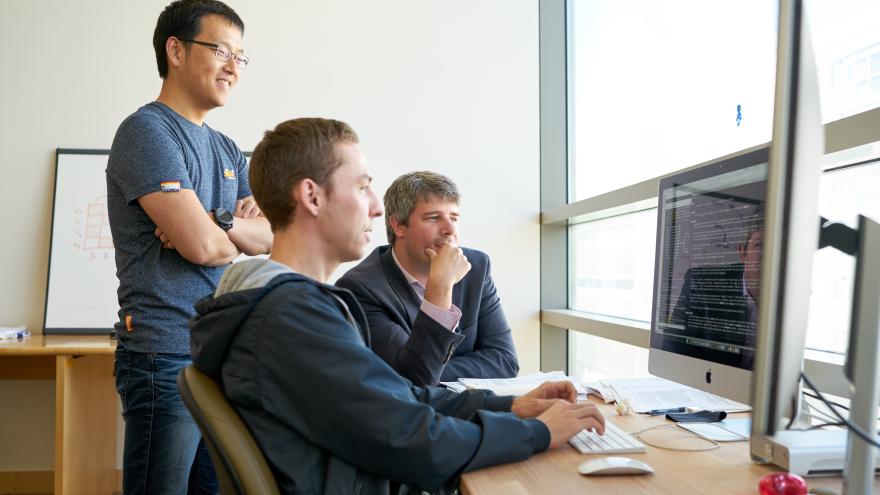 Individuals working on computers