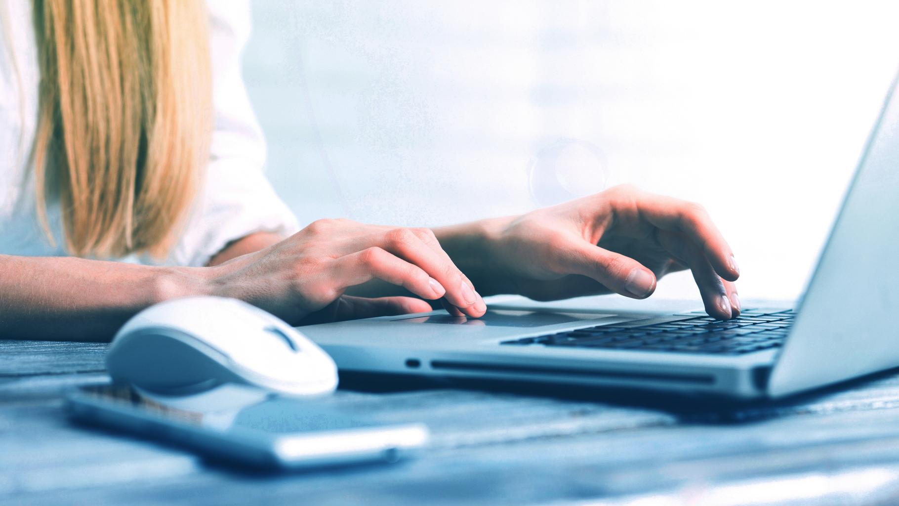 User working at their computer